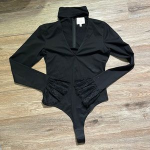 Black long sleeve bodysuit in size small from cinq a sept.